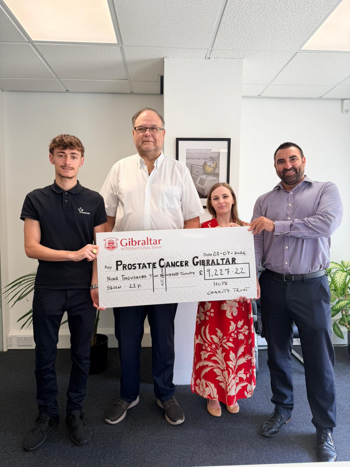 Hope Charity Trust presenting a £9,227.22 donation cheque to Prostate Cancer Gibraltar